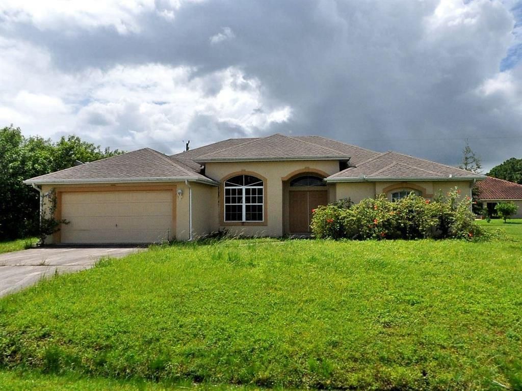 Photo of 1266 SW Santiago Avenue, Port Saint Lucie, FL 34953 (MLS # R10684653)