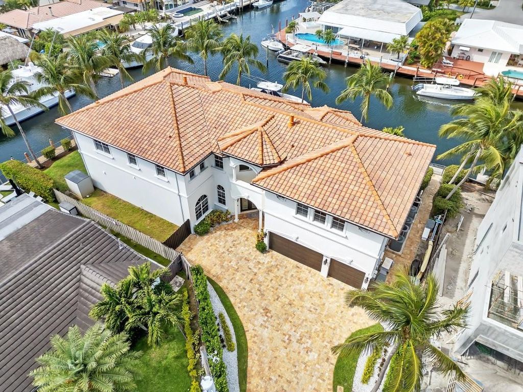 Photo of 1261 NE 27th Way, Pompano Beach, FL 33062 (MLS # B26000758)