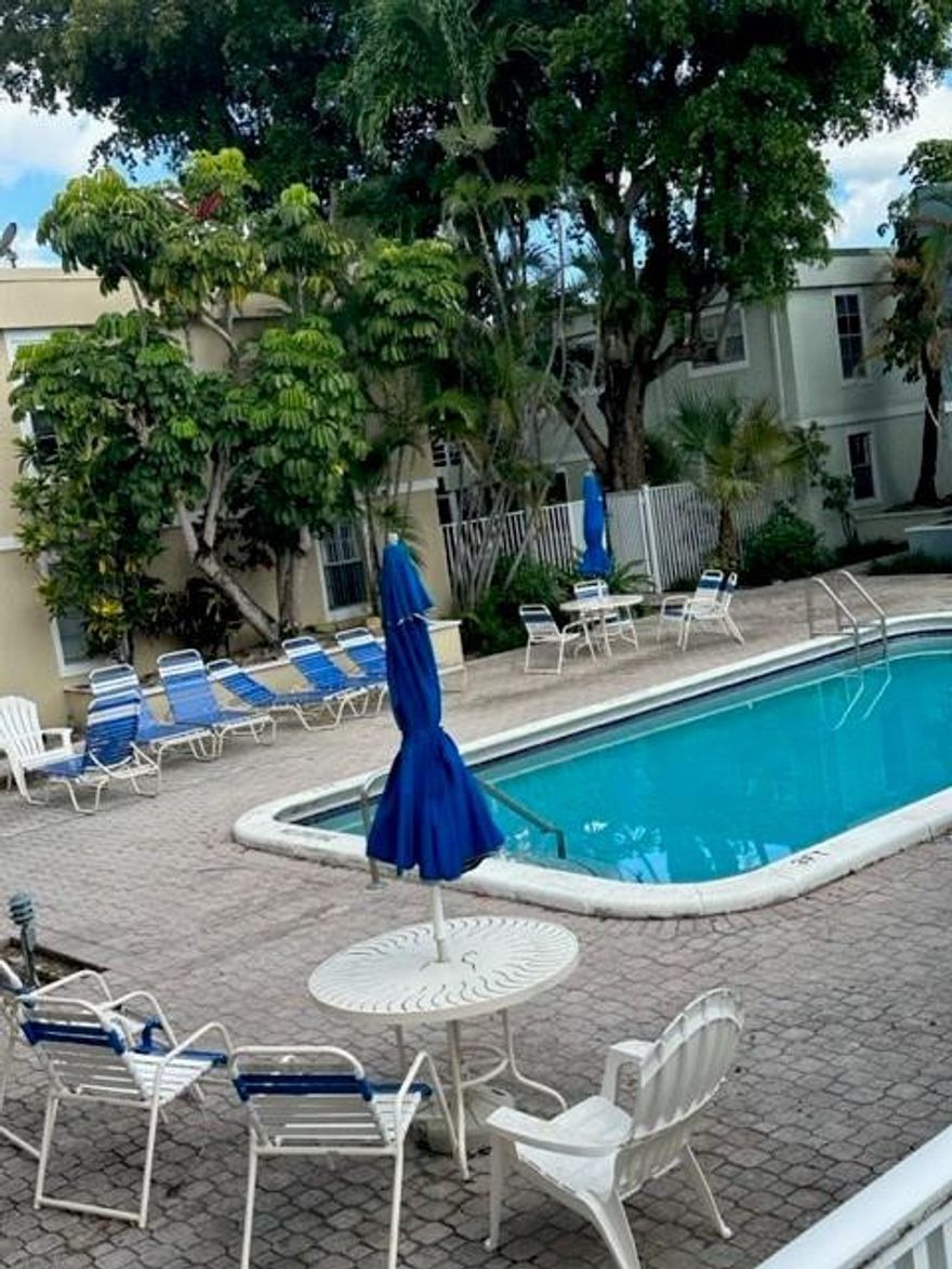 This substantially renovated 3 bed 2 bath condo has open concept kitchen, living area with peninsula seating.Washer/ Dryer in unit! Rental immediately upon close! Tile and Laminate flooring, patio with extra private storage. Convenient location walk to restaurants and attractions, just minutes to the ocean and gorgeous redevelopment area.