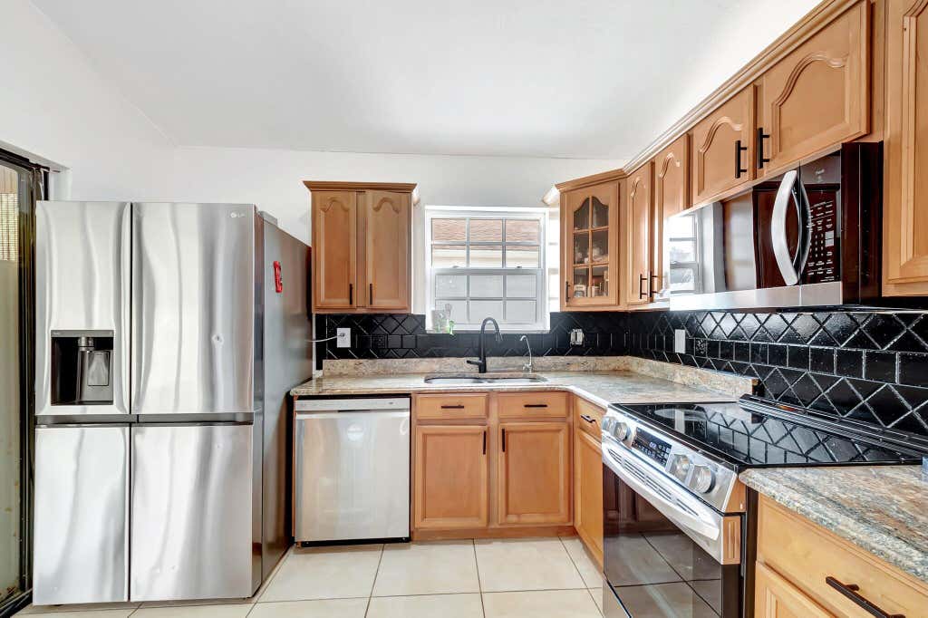 Photo of 54 Buxton Lane, Boynton Beach, FL 33426 (MLS # R11075036)