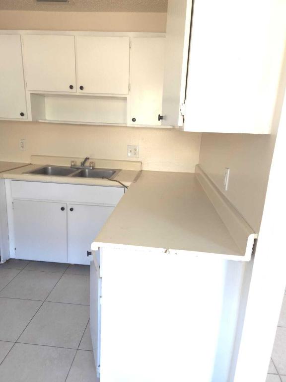 SUNSET TERRACE OF THE PALM BEACHES CONDO - Residential