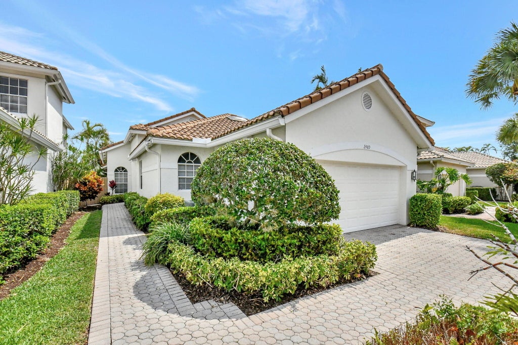 Photo of 2489 NW 66TH Drive, Boca Raton, FL 33496 (MLS # B26094715)