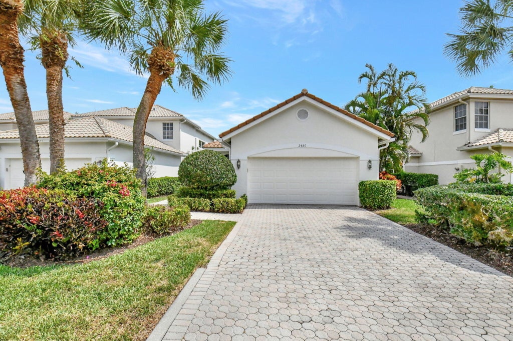 Photo of 2489 NW 66TH Drive, Boca Raton, FL 33496 (MLS # B26094715)