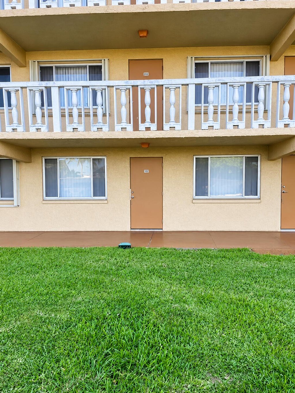 Photo of 100 Village Green Circle E #112, Palm Springs, FL 33461 (MLS # B26093572)