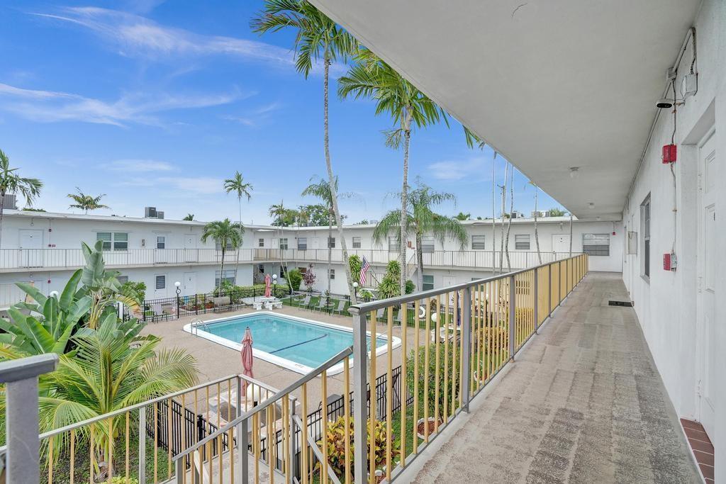 HOA FEES PAID TILL MARCH 2026! Live just minutes from the beach and downtown in this beautifully updated, semi-furnished 2-bedroom, 2-bath retreat. Whether you're searching for your forever home or the ultimate getaway, this light-filled gem delivers. Step into a spacious layout with a large enclosed balcony—perfect for morning coffee, plant therapy, or your own serene sanctuary. Move right in and start enjoying life in this vibrant 55+ community offering a heated pool and peaceful, well-kept grounds. Don’t wait—opportunities like this in Hollywood don’t last long!