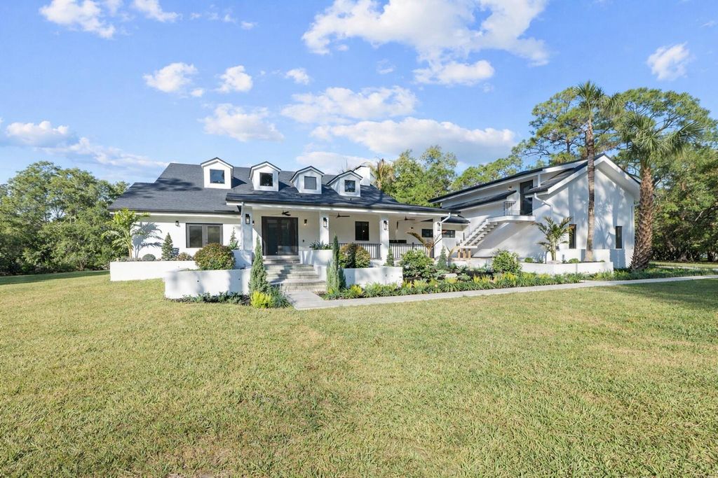 Photo of 16457 115th Avenue N, Jupiter, FL 33478 (MLS # R11163210)