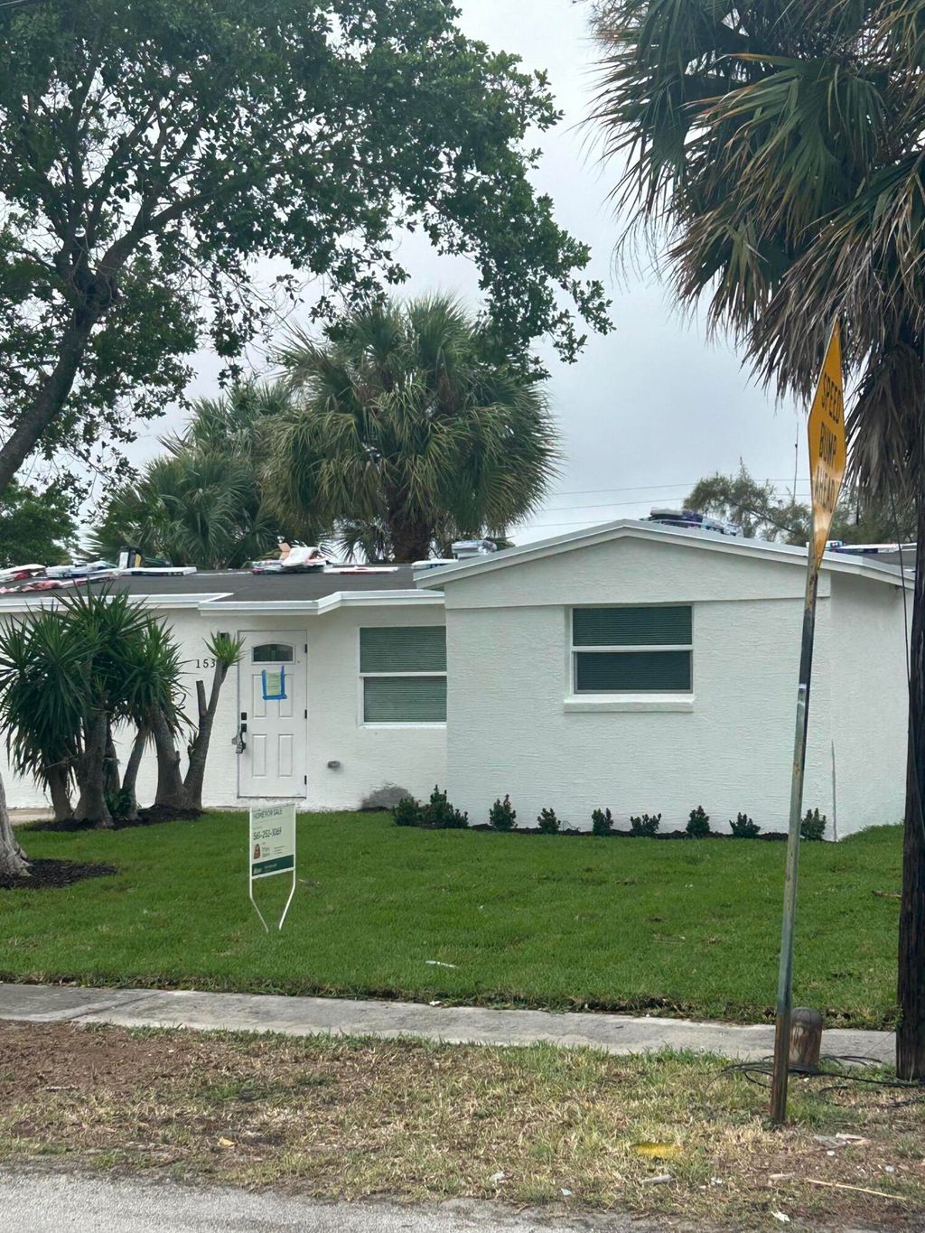 Photo of 1531 W Avenue H W, Riviera Beach, FL 33404 (MLS # B26001129)