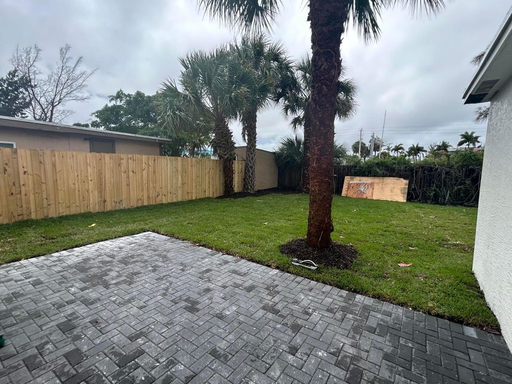 Photo of 1531 W Avenue H W, Riviera Beach, FL 33404 (MLS # B26001129)