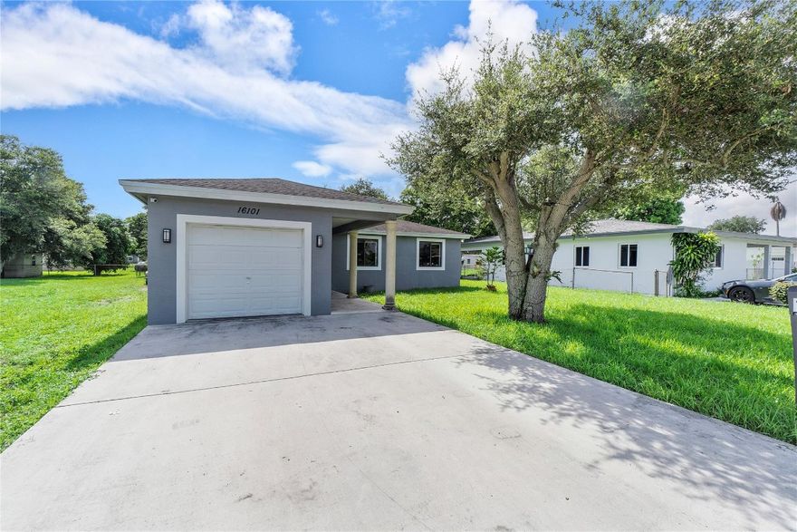 This Beautiful and Super spacious home was built in 2014 and still looks impecable, is like touring a brand-new home, 4 bedrooms and 2 bathrooms, 1 car garage. The kitchen has an open layout with granite countertops, Stainless-steel appliances & wood cabinetry. Master bedroom is very spacious with Walkin closet, Full high Impact windows and doors for your storm protection, tile throughout, An extensive lot full of green areas on front and back-patio. Centrally located, easy to connect with Palmetto Expressway & I-95.