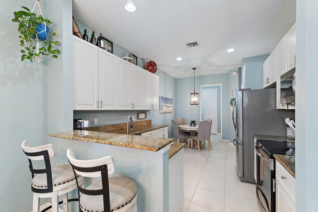 Photo of 2170 SW CAPE COD Drive, Port Saint Lucie, FL 34953 (MLS # B26061736)