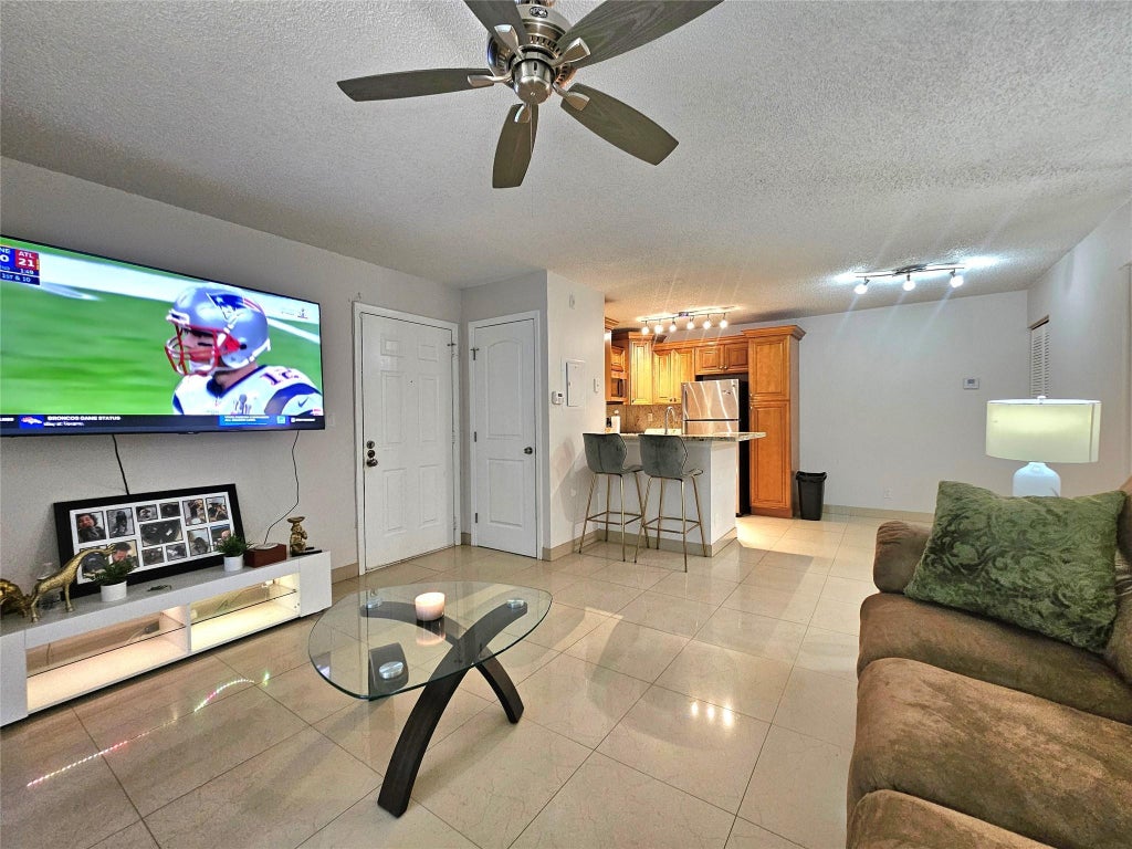 Photo of 701 Lyons Road #13103, Coconut Creek, FL 33063 (MLS # B26075608)