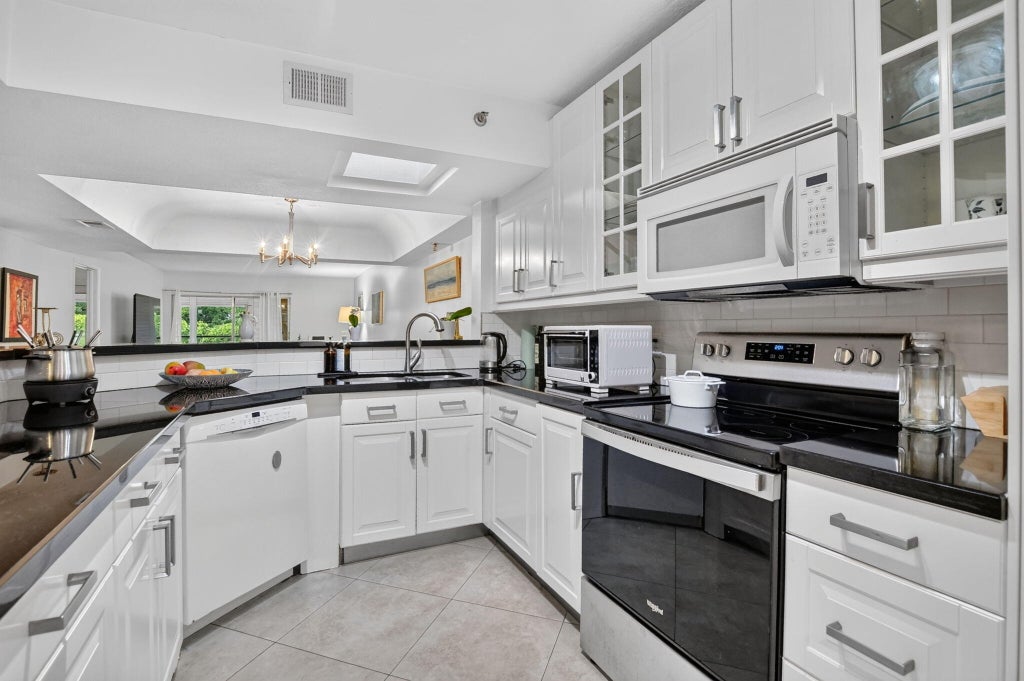 Photo of 23344 CAROLWOOD Lane #505, Boca Raton, FL 33428 (MLS # B26085381)