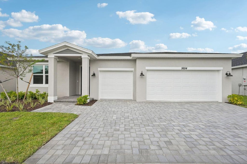 Photo of 5654 Hampton Park Circle, Vero Beach, FL 32966 (MLS # R11109203)