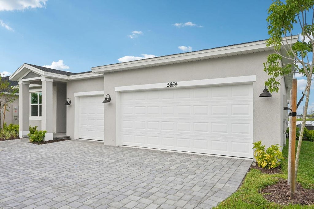Photo of 5654 Hampton Park Circle, Vero Beach, FL 32966 (MLS # R11109203)