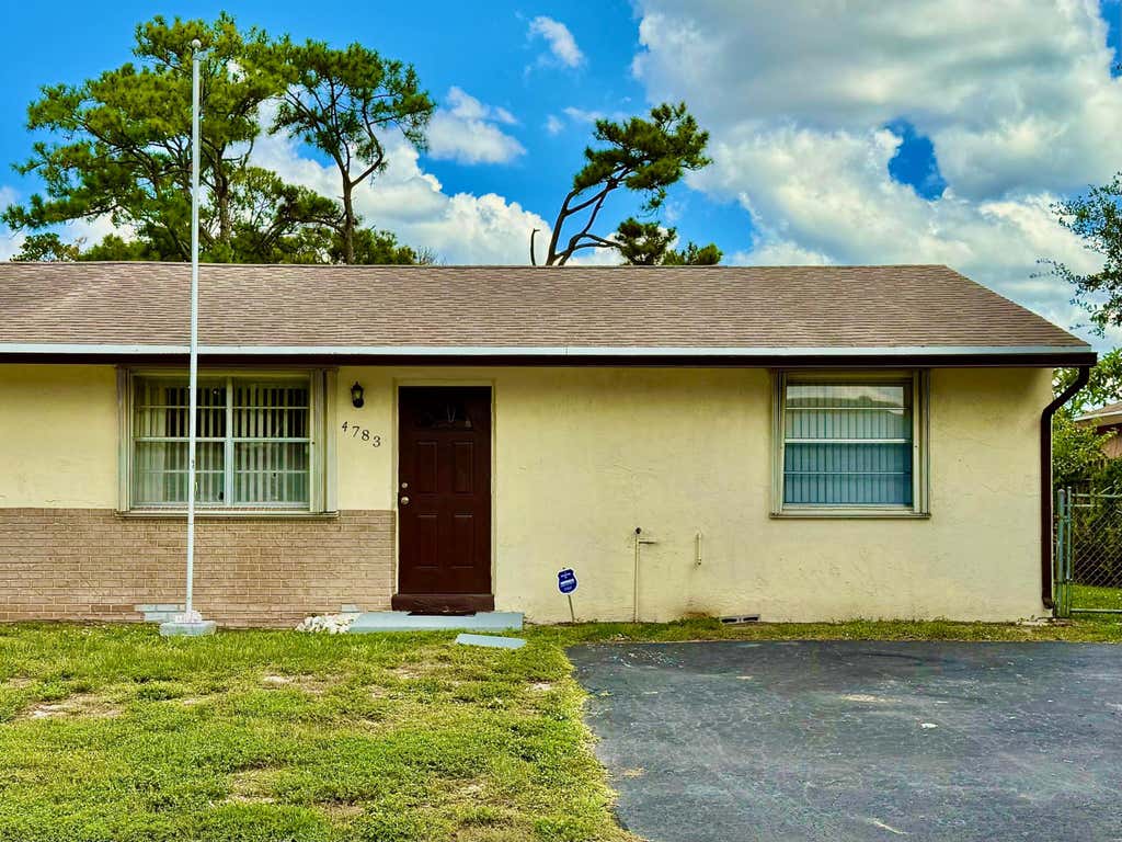 Photo of 4783 Gladiator Circle, Greenacres, FL 33463 (MLS # B26065045)
