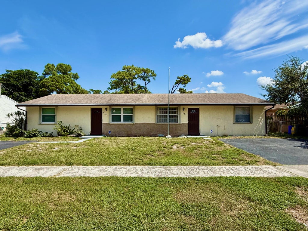 Photo of 4783 Gladiator Circle, Greenacres, FL 33463 (MLS # B26065045)