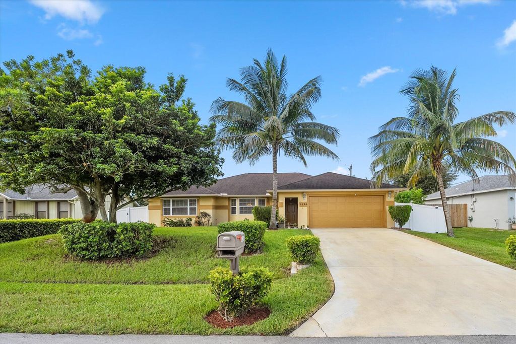 Photo of 1626 SW Meridian Avenue, Port Saint Lucie, FL 34953 (MLS # R10911825)