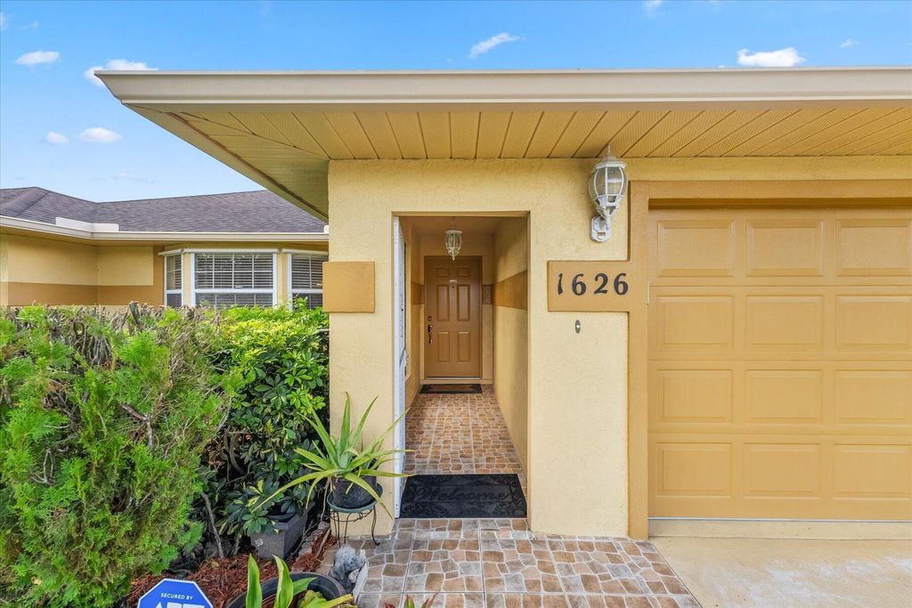 Photo of 1626 SW Meridian Avenue, Port Saint Lucie, FL 34953 (MLS # R10911825)