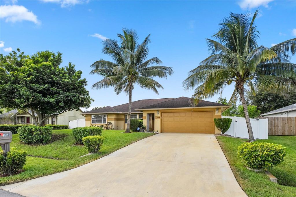 Photo of 1626 SW Meridian Avenue, Port Saint Lucie, FL 34953 (MLS # R10911825)