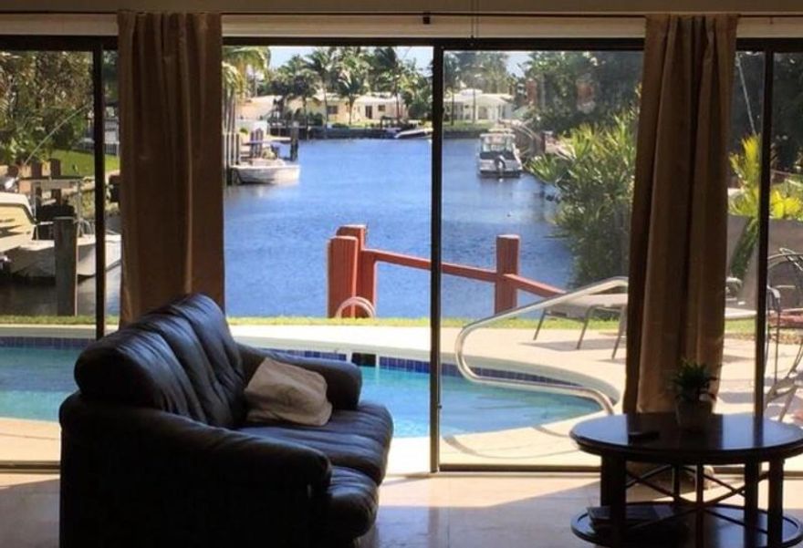 Uniquely perched at the end of the Intracoastal with direct breathtaking views that go on and on!  Fulfill your waterfront living dreams of daily boating and endless warm sunsets while overlooking the beautiful waterways of Pompano Beach. Swim in your heated pool year round and say good-bye to the brutal winters of the North and begin welcoming the endless summer days of the south! This open kitchen floor plan, 3 bedroom home will satisfy all of your family's needs as well as desires.  Live in Paradise!