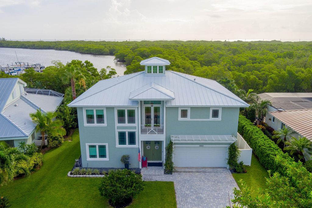 Photo of 3950 NE Joes Point Road, Stuart, FL 34996 (MLS # R10907471)