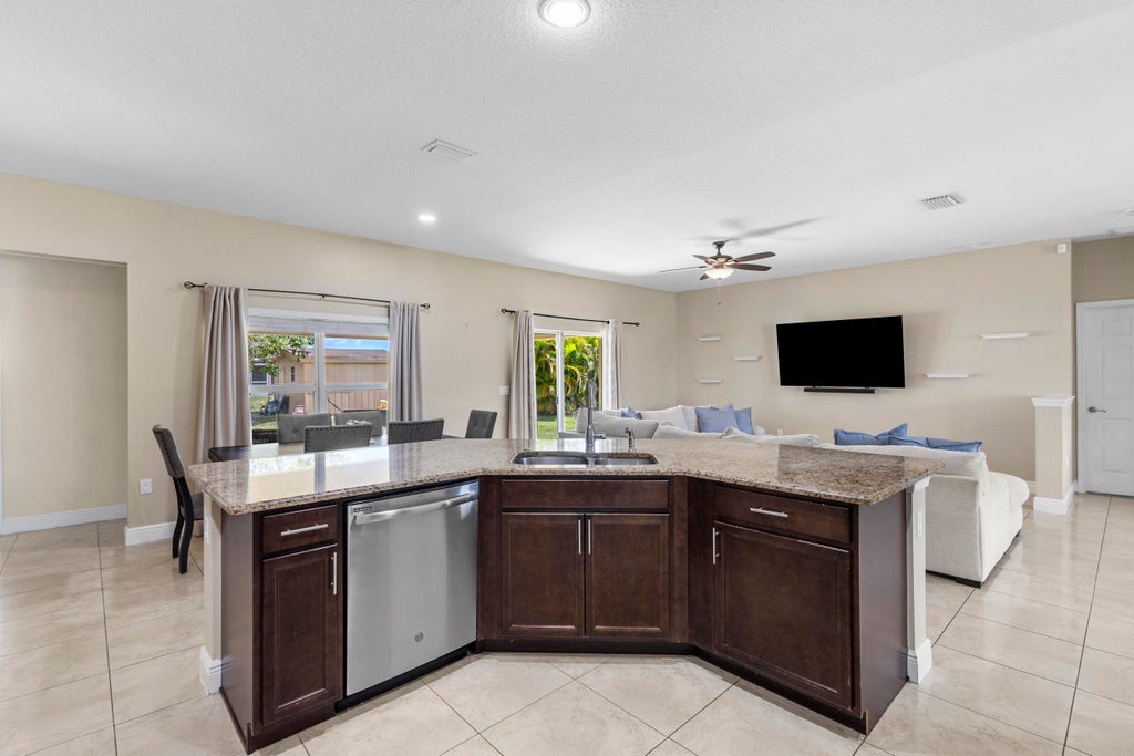 Photo of 1571 SW Apricot Road, Port Saint Lucie, FL 34953 (MLS # R10994530)