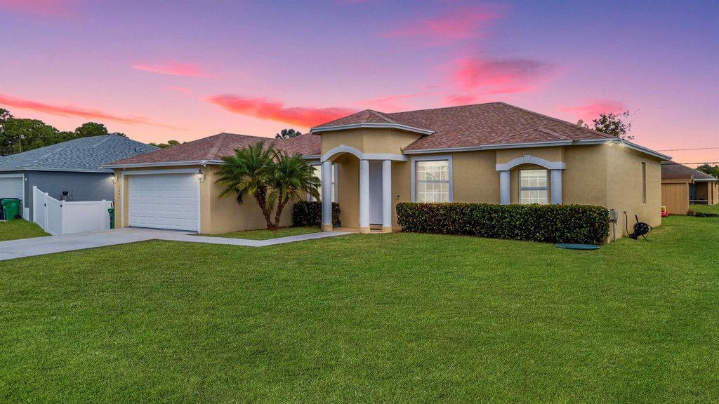 Photo of 1571 SW Apricot Road, Port Saint Lucie, FL 34953 (MLS # R10994530)