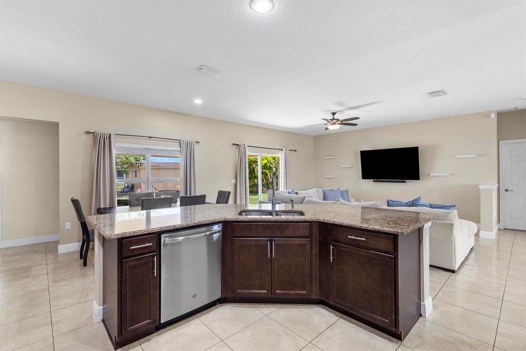 Photo of 1571 SW Apricot Road, Port Saint Lucie, FL 34953 (MLS # R10994530)