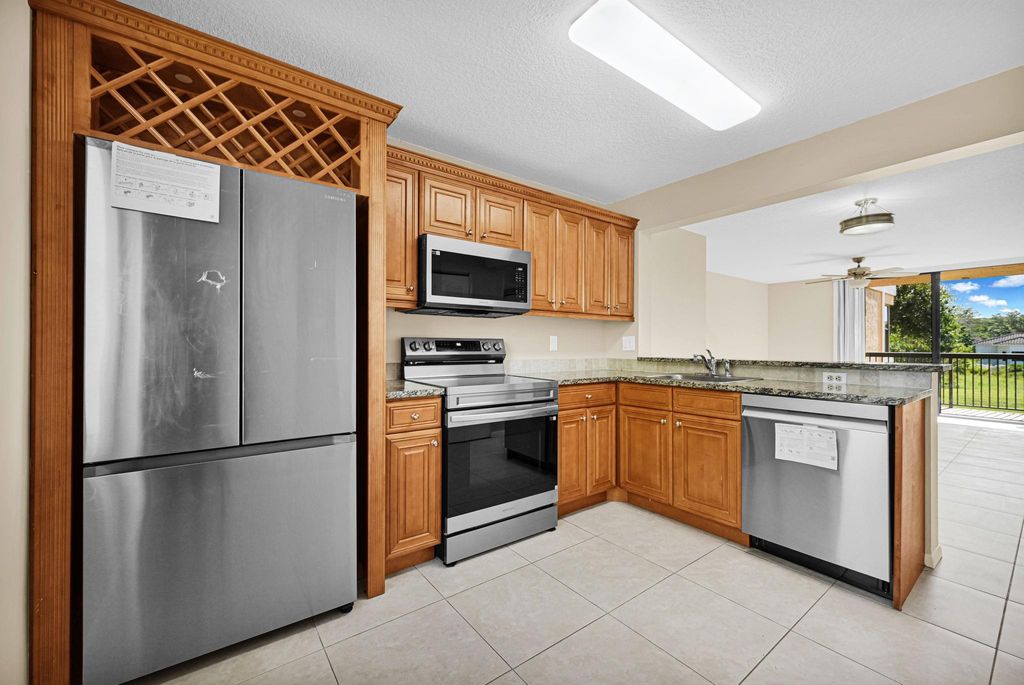 Photo of 5661 Riverside Drive #206, Coral Springs, FL 33067 (MLS # F10516651)