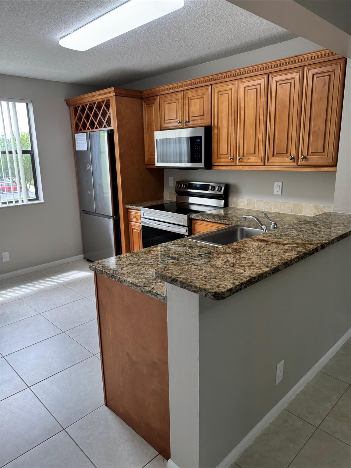 Water views! Only first month rent and security deposit required for move in. Large Balcony! Updated kitchen with brand new stainless steel appliances. Tile flooring in living areas and Laminate in bedrooms, Washer and Dryer in unit! Bedrooms open to Balcony! Water included in rent! Popcorn removed from the ceilings and unit compketely repainted for new tenant. New lighting fixtures, New ceiling fans, New toilets. Association approval required. Minimum 650 credit score required.