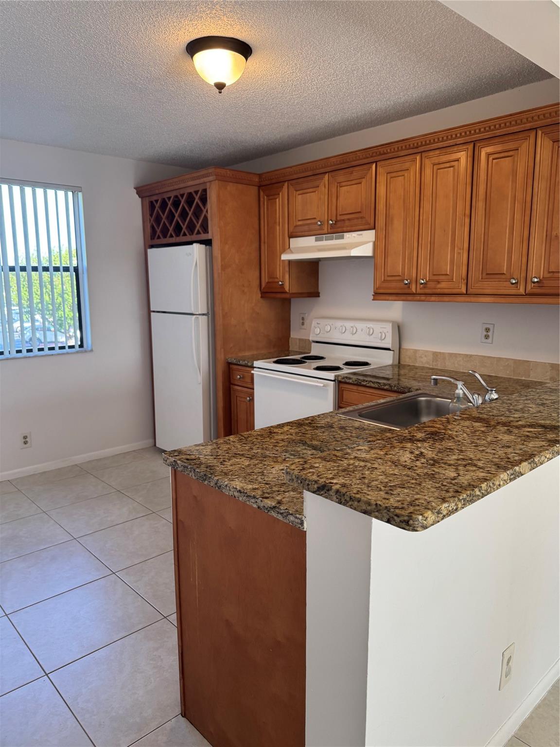 Water views! Only first month rent and security deposit required for move in. Large Balcony! Updated with new kitchen. Tile flooring in living areas and Laminate in bedrooms, Washer and Dryer in unit! Bedrooms open to Balcony! Water included in rent! Popcorn is being removed from the ceilings and unit to be repainted for new tenant. Association approval required.