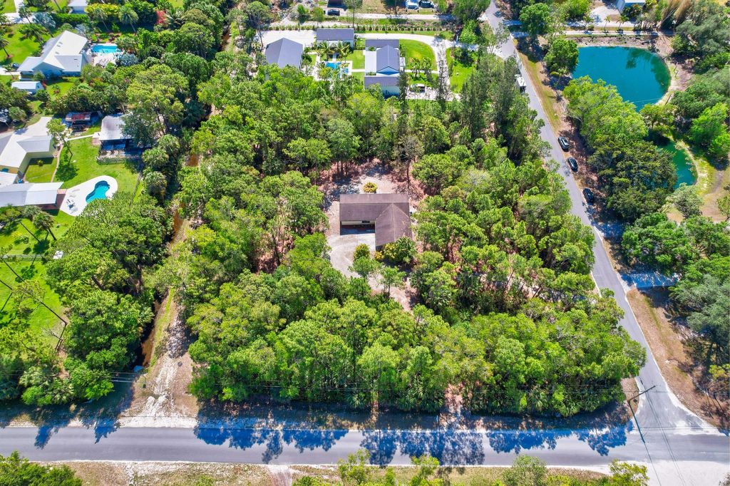 Photo of 11473 154th Road N, Jupiter, FL 33478 (MLS # R11089575)