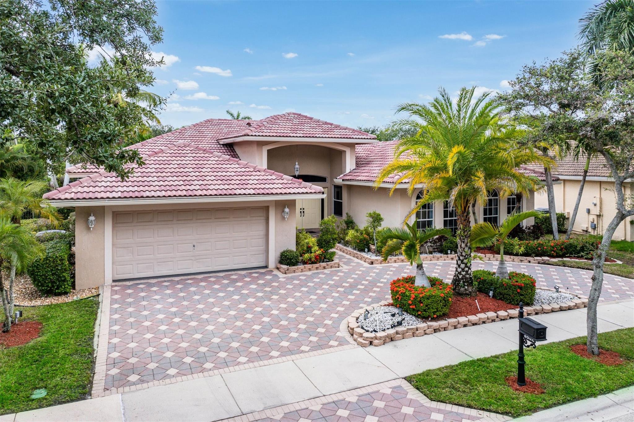 Nestled in the prestigious, guard-gated community THE RIDGES of WESTON, stunning 5 bdr 3 ba +office pool home is the perfect blend of elegance & modern living. Impeccably designed, this residence boasts over 2800 air conditioned sq ft, soaring ceilings, abundant natural light, circular driveway & exterior lights creating an inviting atmosphere for relaxation & entertaining! Remodeled chef's kitchen features ss appliances, ample counter space & custom wood cabinetry. Primary suite includes a spa inspired bathroom. Step outside to find your private oasis where a sparking resurfaced pool & lush landscape provide ultimate tranquility! Unparalleled community amenities include a clubhouse, fitness, tennis, & pool. Top rated schools! Minutes from highways & hospital. Luxury, Location & Lifestyle!