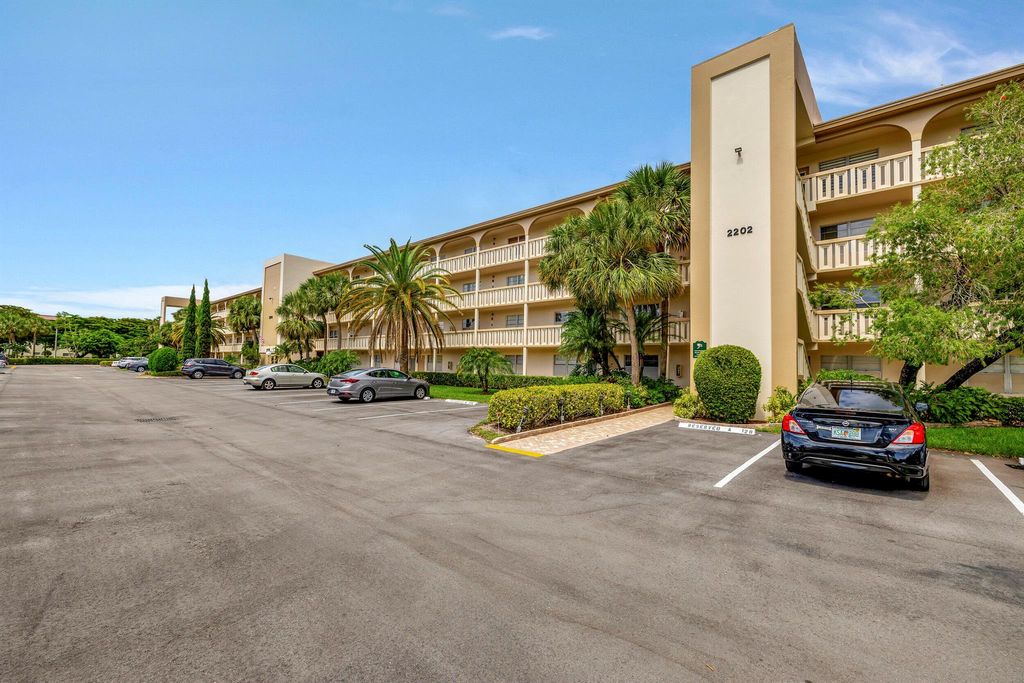 Photo of 2202 Lucaya Bend #M1, Coconut Creek, FL 33066 (MLS # R10896045)