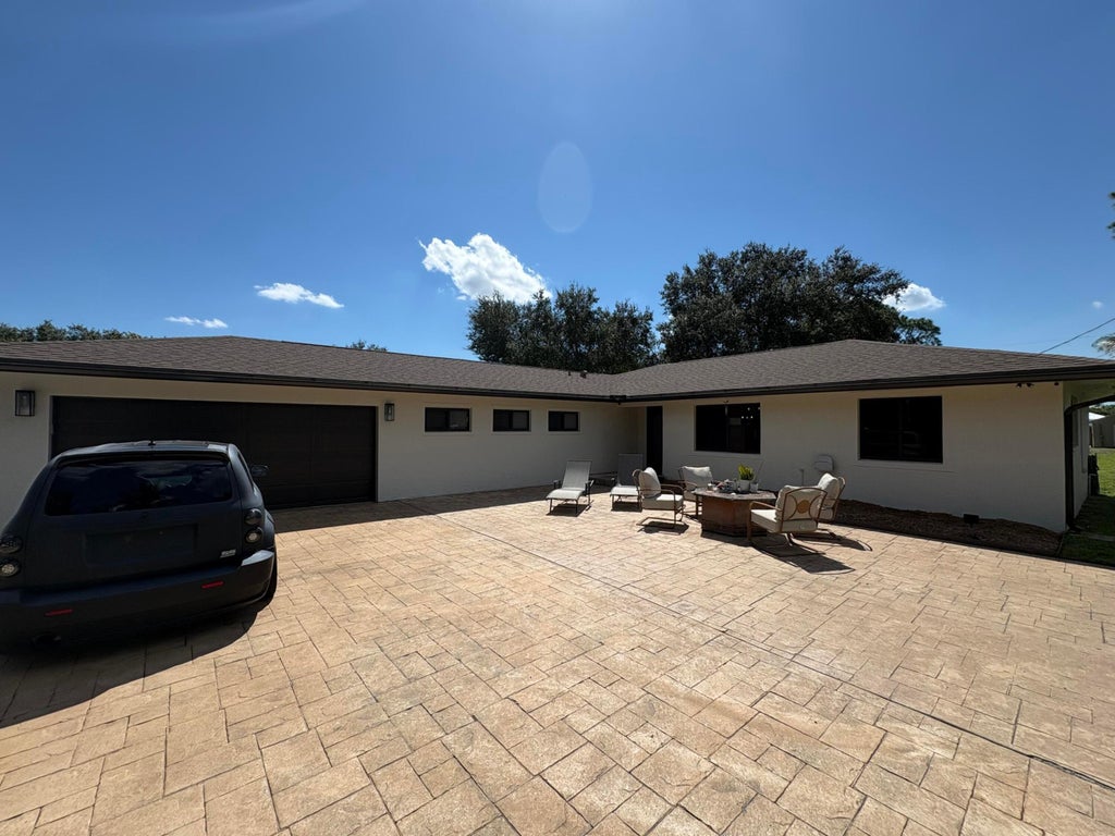 Photo of 5139 1st Road, Lake Worth, FL 33467 (MLS # B26082707)