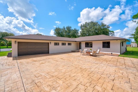 Photo of 5139 1st Road, Lake Worth, FL 33467 (MLS # B26082707)