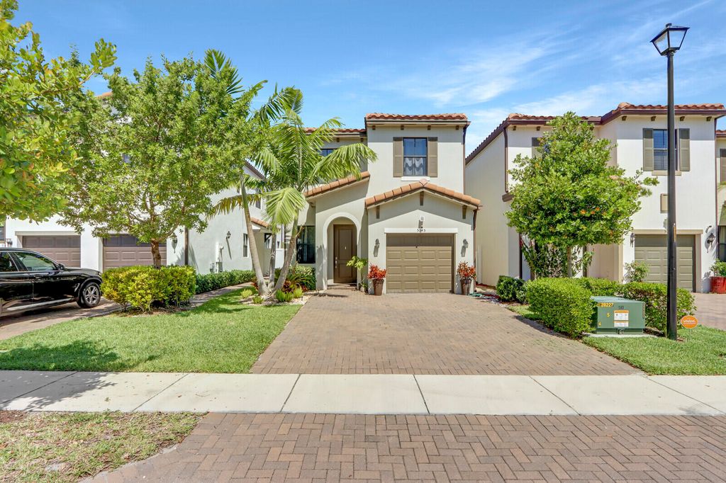 Photo of 5045 Laurel Oak Drive Dr, Riviera Beach, FL 33410 (MLS # R10812312)