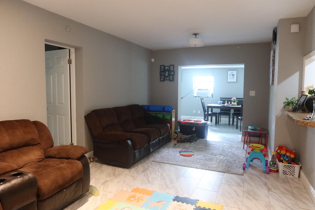 Photo of 1751 LAUDERDALE MANOR Drive, Fort Lauderdale, FL 33311 (MLS # B26057080)