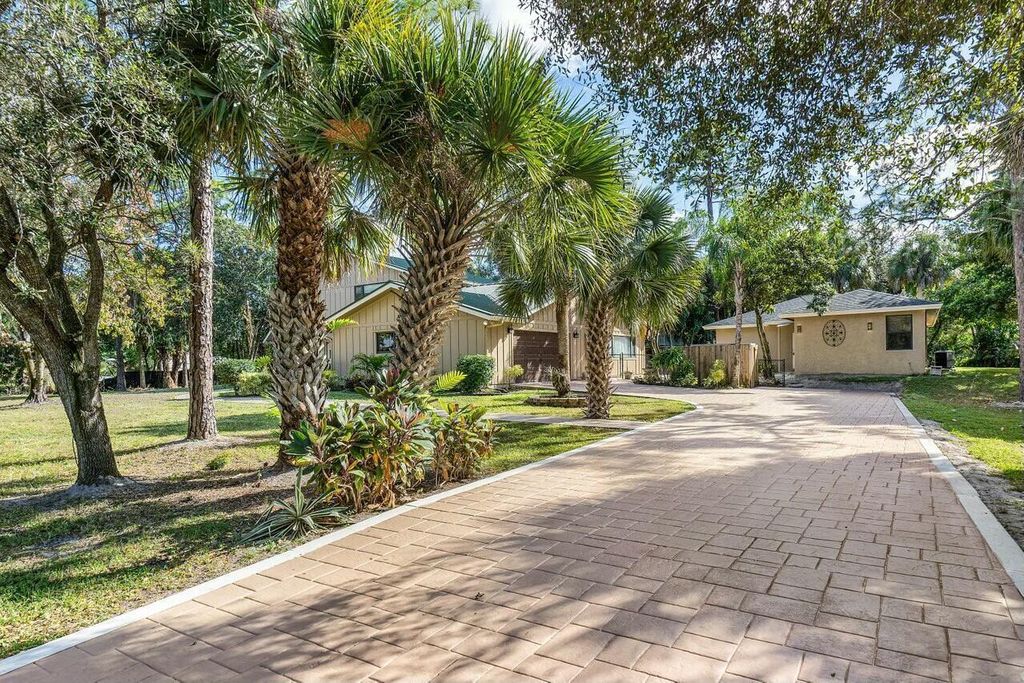 Photo of 9266 Pinion Drive, Lake Worth, FL 33467 (MLS # B26030320)