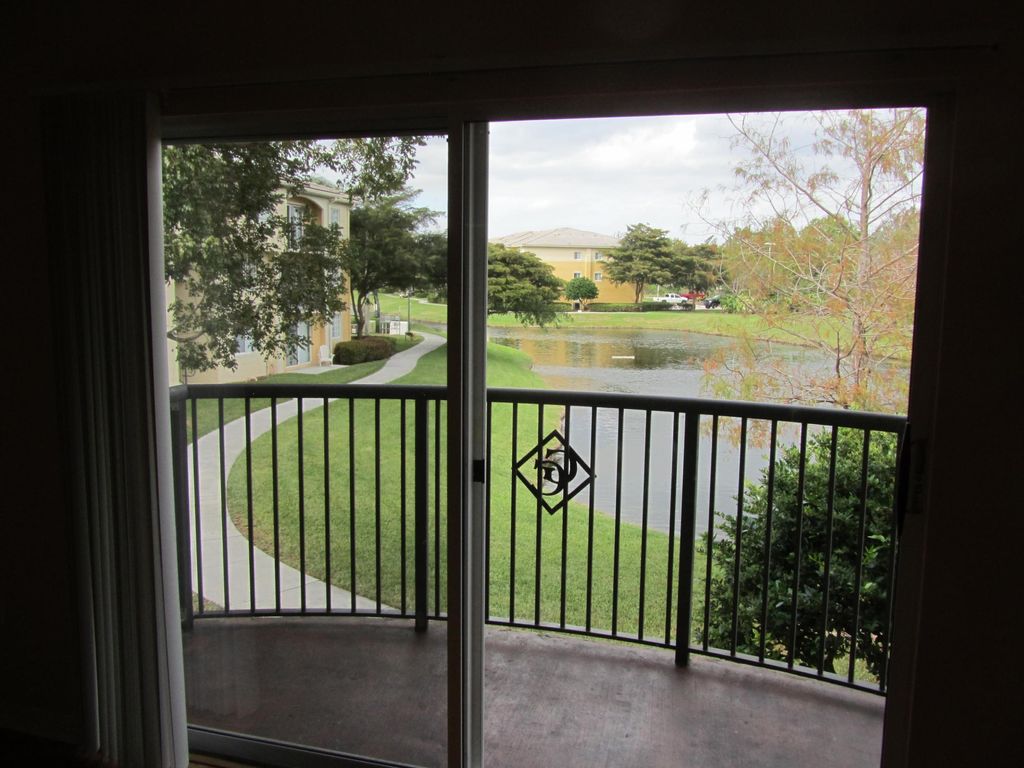 Photo of 700 S Crestwood Court S #704, Royal Palm Beach, FL 33411 (MLS # B26043818)