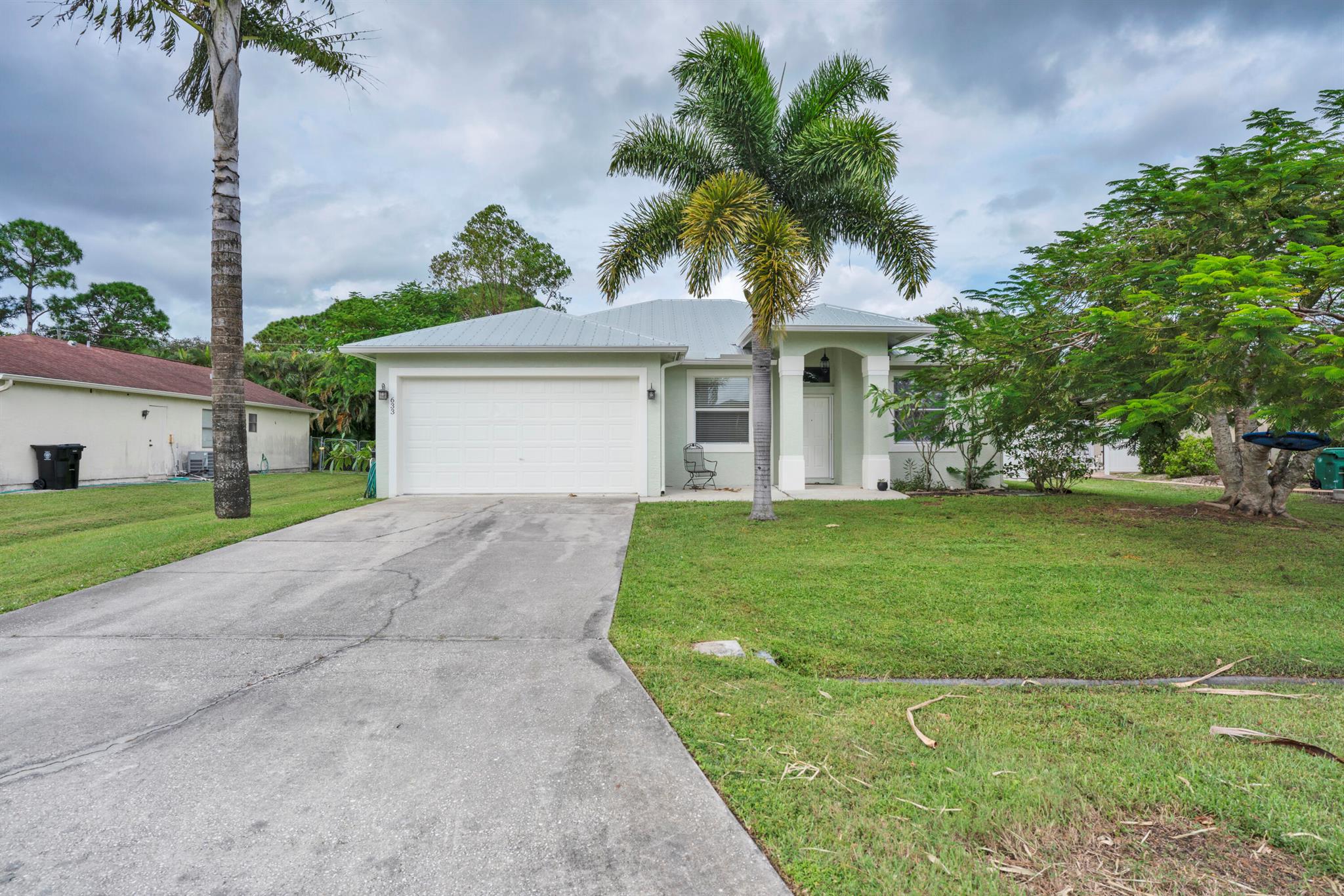 Don't miss this opportunity! 3 bed 2 bath 2 car garage CBS home in a great location. Over 1500 sq feet with an open floor plan. Living room, dining room and kitchen open up to sliding glass doors that go out to the fenced in backyard. Primary bedroom has a walk in closet and the primary bath has a walk in shower. Oversized 2 car garage for storage. Pets will be considered with a $300 pet fee. No aggressive breeds. $100000 tenant insurance required. Convenient location close to Crosstown Parkway, Florida turnpike and I95.