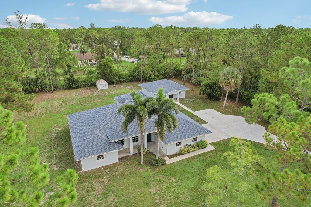 Photo of 16655 82nd Road N, Loxahatchee, FL 33470 (MLS # R11000332)