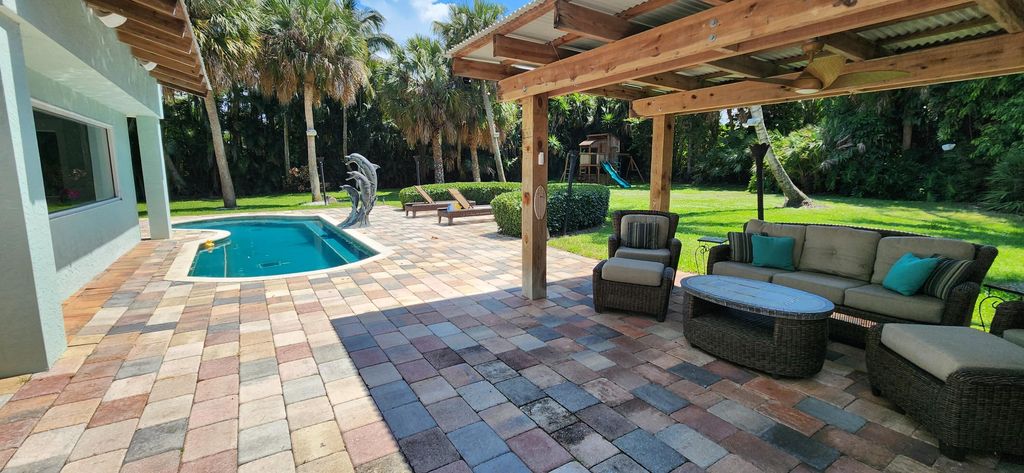 Photo of 1066 SE St Lucie Boulevard, Stuart, FL 34996 (MLS # B26018528)