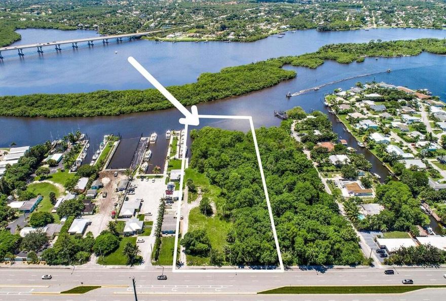 An EXCEPTIONAL commercial opportunity in one of Stuart's fastest-growing corridors. This 2.6-ACRE WATERFRONT parcel on Kanner Highway offers incredible flexibility with Martin County zoning and approved, permitted plans for 9 boat slips and a dock already in place.

Extensive due diligence has been completed, including environmental studies, soil testing, and additional reports, all of which are available upon request, making this a truly shovel-ready opportunity for a variety of development paths. Permitted uses allow for multifamily residential (up to 17 townhomes, for example), dry boat storage, retail, and other commercial uses, full details available in the documents tab.

Located in a rapidly transforming section of Stuart, this property sits directly along Kanner Highway, an an area seeing significant investment and growth. Costco is just across the street, with new townhome communities, apartment developments, and a nearby shopping plaza already underway, further solidifying this location as a prime destination for future development.

With waterfront access, strong zoning flexibility, completed due diligence, and positioning in an up-and-coming commercial hub, this property presents a rare opportunity to capitalize on the momentum of one of Stuart's most promising growth areas.
