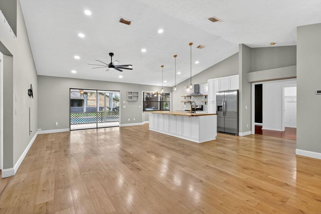 Photo of 2479 SE Whitehorse Street, Port Saint Lucie, FL 34984 (MLS # R11129607)