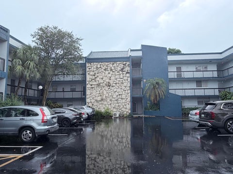 Photo of 3090 HOLIDAY SPRINGS Boulevard #105, Margate, FL 33063 (MLS # B26072604)