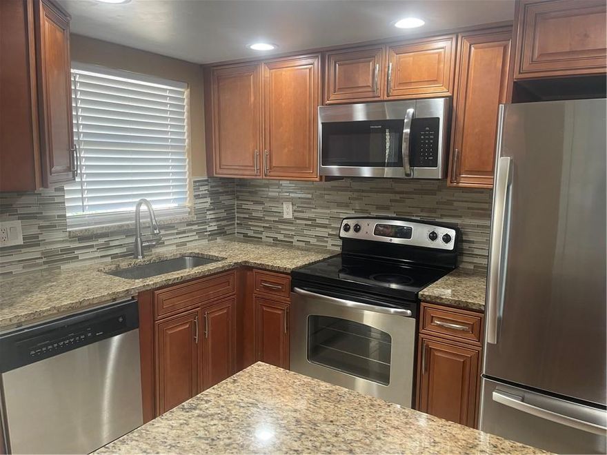 Spacious and well-maintained 2 bedroom 2 bathroom first floor condo. Unit features a split floor plan with stainless steel appliances, tile flooring throughout rooms and living room, with peaceful lake view from your enclosed porch and master bedroom.  Clean and serene  Sunrise Lakes is a 55+ which offers lots of entertainment, six pools, bingo, dance, exercise and pool tables rooms, golf, yoga, heated pools, courtesy bus, BBQ picnic area and more.....  Parking spot conveniently located right in front of the unit. CREDIT SCORE 670+, net income of $2400.
