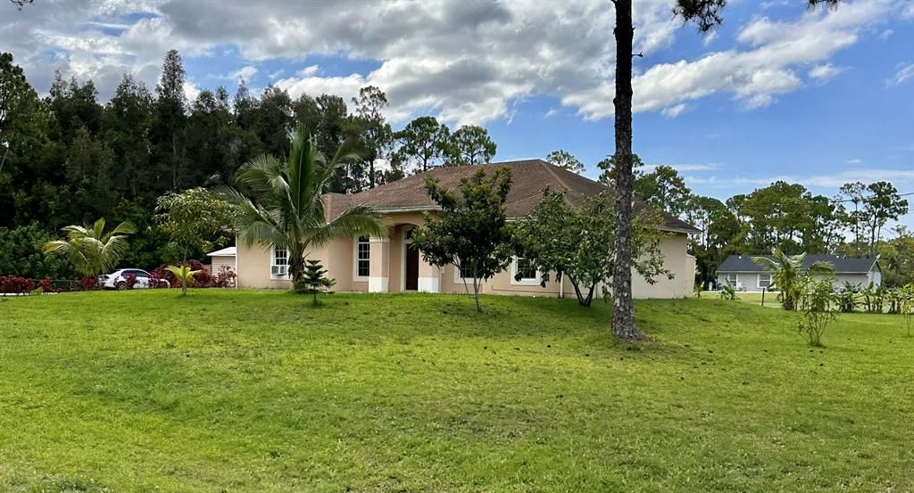 Photo of 14085 86th Road N, Loxahatchee, FL 33470 (MLS # R10894034)