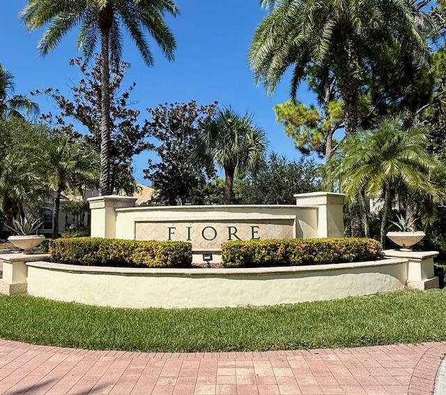 Fiore One bedroom condo on second floor has a very large sunroom which can be used as home office located on he second floor offering 932 sq ft living space is ready for move-in. The condo features newly installed carpet, an extra space off living area can be used for office or room, it is very clean, and located in a gated community offering many amenities: Large community pool, BBQ area, putting green area, Beach Volleyball court, Car wash station and assigned parking.