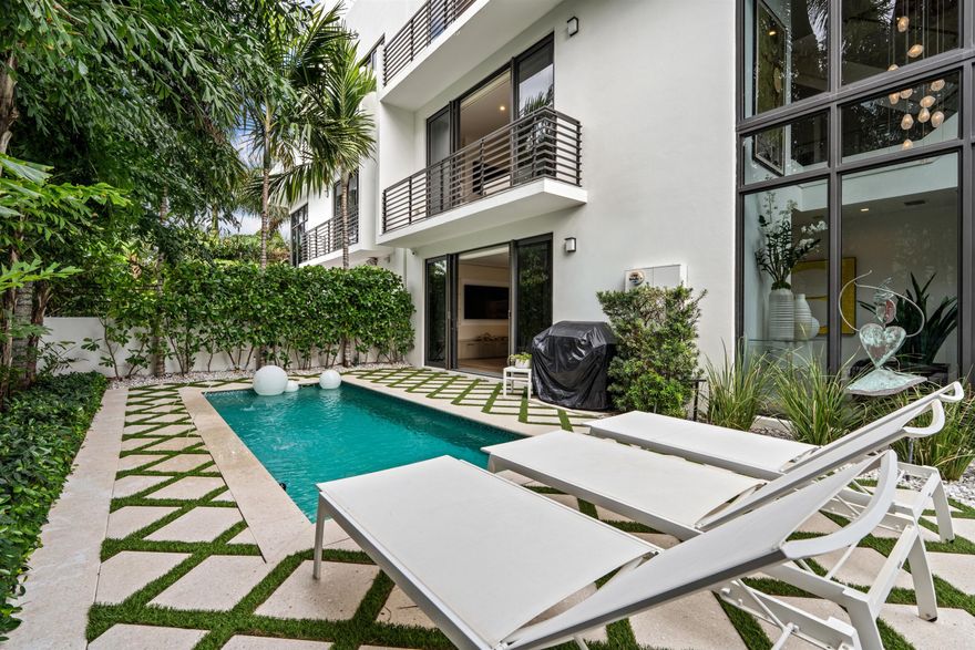 Built in 2017, this chic contemporary-style four-story townhome at the 150 Oceanside development features a spectacular two-story glass wrapped foyer atrium, a landscaped courtyard pool area, and on the fourth floor, a secluded rooftop deck offering ocean views. Sited in a perfect Delray Beach location, the townhome is one block from the ocean and two blocks from the heart of downtown. 152 Andrews Drive, Delray Beach, Florida: Within a secure and affluent north beach neighborhood, 150 Oceanside, an enclave with six townhome residences, brings modern luxury living to Delray Beach in grand style, situated one block from the beach and two blocks from the boutiques and eateries on vibrant downtown Atlantic Avenue.


PROPERTY: 
 
Offering seamless indoor/outdoor living, this luxury townhome features a tropically landscaped gated courtyard that extends to the side terrace with a jetted plunge pool. The private fourth-floor rooftop deck, overlooking panoramic ocean-to-city views, features wood- and porcelain-tile flooring and includes a full-service summer kitchen with a grill, refrigerator and sink. 

RESIDENCE: 

For sophisticated seaside intown living, this chic three-bedroom contemporary townhome, with 5547+/- total square feet, showcases a dramatic two-story atrium foyer wrapped in floor-to-ceiling impact glass that enhances and elevates the entry. For indoor/outdoor entertaining, just adjacent on the first floor is the club room appointed with a built-in media center, wet bar fitted with a refrigerator and wine cooler, and floor-to-ceiling sliding glass doors that access the beautifully landscaped pool terrace. On the second floor, the great room, comprising living and dining areas, features bespoke built-in cabinetry that incorporates a biofuel fireplace and impact-glass sliding doors that access a treetop-view balcony. In an open-concept layout, the adjacent Kitchen Art island kitchen is fitted with sleek contemporary custom cabinetry, quartz countertops and Miele appliances. Also on this level are a guest bedroom suite with sliding doors to a private sunrise balcony, a half bath and laundry room. On the third floor, the primary suite and the guest bedroom suite both access private balconies. The bedroom of the primary suite features bespoke custom cabinetry that incorporates upholstered wall panels, desk, nightstands and headboard. Completing the suite are a custom-fitted walk-in closet and a bathroom finished with dual sinks, custom cabinetry, quartz counters, soaking tub, walk-in shower, and a water closet with a Toto toilet. Details throughout include wood-plank flooring, impact-glass windows and doors, custom tile in the bathrooms, a generator and three Carrier air conditioners, while completing the layout are an elevator and attached two-car garage with epoxy flooring. This elegant residence is sure to please! Enjoy salt air and ocean breezes, with terraces and balconies that offer indoor/outdoor living on every level!

DISCLAIMER: Information published or otherwise provided by the listing company and its representatives including but not limited to prices, measurements, square footages, lot sizes, calculations, statistics, and videos are deemed reliable but are not guaranteed and are subject to errors, omissions or changes without notice. All such information should be independently verified by any prospective purchaser or seller. Parties should perform their own due diligence to verify such information prior to a sale or listing. Listing company expressly disclaims any warranty or representation regarding such information. Prices published are either list price, sold price, and/or last asking price. The listing company participates in the Multiple Listing Service and IDX. The properties published as listed and sold are not necessarily exclusive to listing company and may be listed or have sold with other members of the Multiple Listing Service. Transactions where listing company represented both buyers and sellers are calculated as two sales. "No payments made until title passes" Some affiliations may not be applicable to certain geographic areas. If your property is currently listed with another broker, please disregard any solicitation for services. Information published or otherwise provided by seller, listing company or its representatives is deemed reliable but are not guaranteed and subject to errors, omissions, or changes without notice. Copyright 2026 by the listing company. All Rights Reserved.